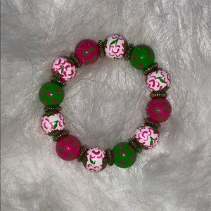 Angela Moore pink, green and white bracelet